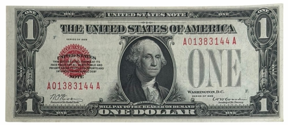 Series Of 1928 United States $1 Red Seal Funny Back Legal Tender Note: Series Of 1928 United States $1 Red Seal Funny Back Legal Tender Note. The note is in high grade condition and is serial number A01383144A.