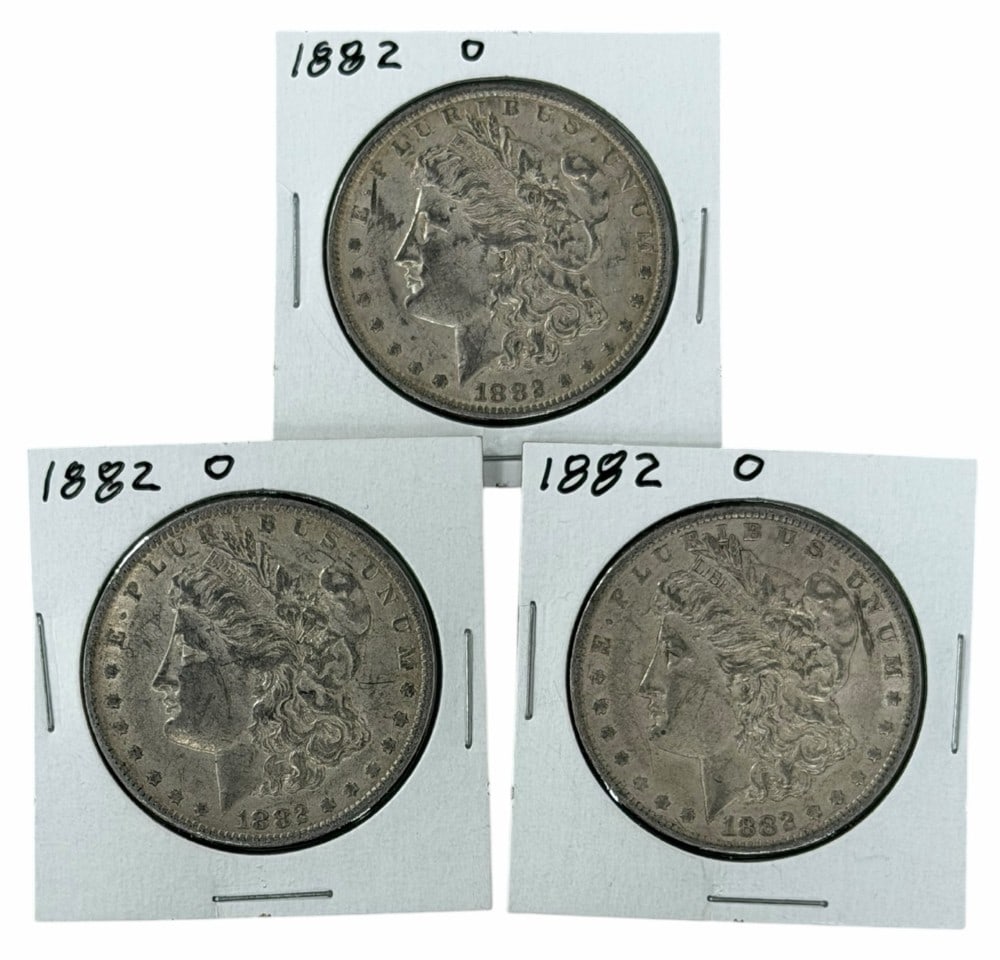 (3) 1882-O United States Morgan Silver Dollars: Lot includes (3) 1882-O Morgan Silver Dollars in circulated condition.