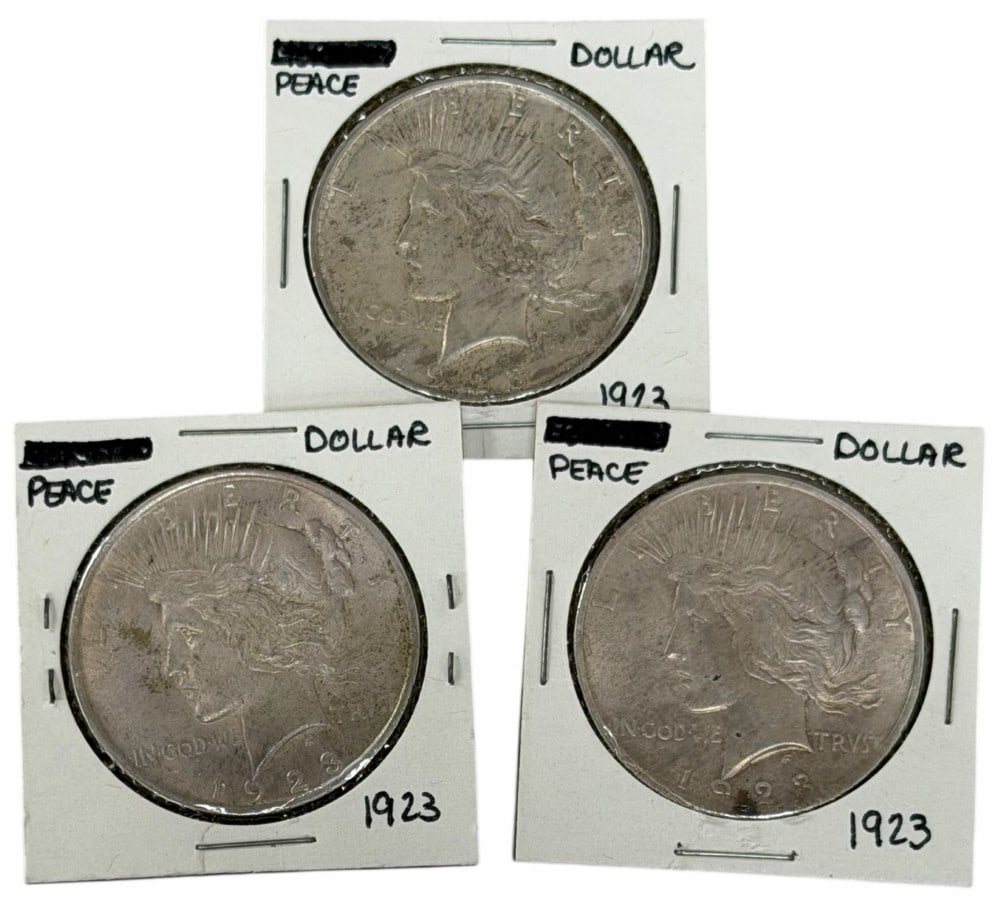 (3) 1923 United States Peace Silver Dollars: Lot includes (3) 1923 Peace Silver Dollars in circulated condition.