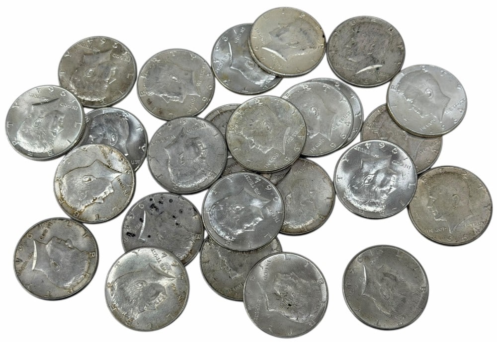 $12.50 Face Value Of 1964 P&D 90% Silver Kennedy Half Dollars: $12.50 Face Value of 1964 P&D 90% Silver Kennedy Half Dollars. Twenty-five coins with mixed conditions.