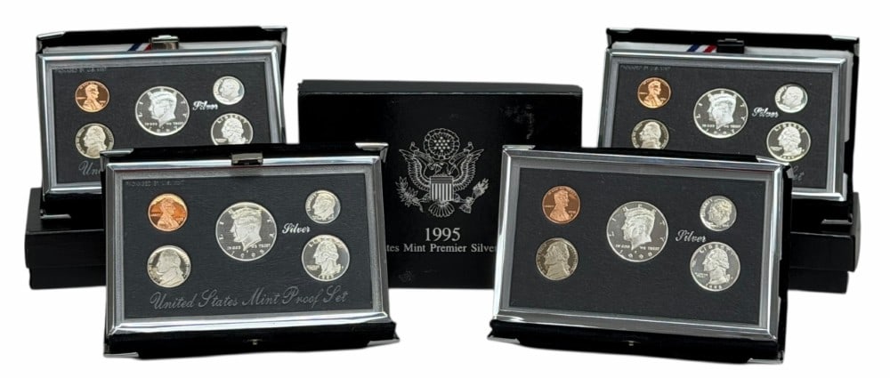 United States Mint 1995, (2) 1997 & 1998 Premier Silver Proof Sets: U.S. Mint 1995, (2) 1997 & 1998 Premier Silver Proof Sets. The sets are in new condition in the original boxes with paperwork except the 1998 is missing the outer box & COA. Each set contains 85 cents