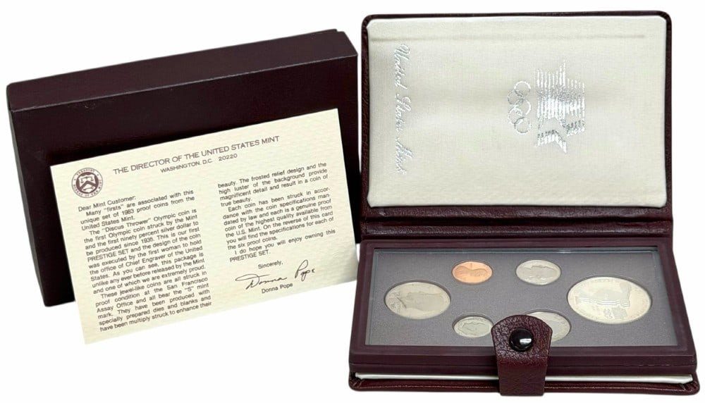 1983 United States Mint Prestige Proof Set: 1983 U.S. Mint Prestige Proof Set. The set is in new condition in the original box with paperwork. The set includes the 90% silver Olympic Commemorative Dollar. Total silver weight is .7734 troy ounce