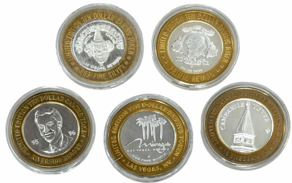 Lot Of Five $10.00 Mixed Silver Casino Tokens: Lot of five mixed $10 Silver Gaming Tokens. The center of each token contains .60 troy ounce of .999 fine silver surrounded by a solid brass band. Total silver weight is 3.0 troy ounce of pure silver.