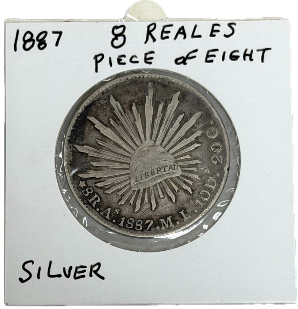 1887-As ML Mexico First Republic 8 Reales Silver Coin: 1887-As ML Mexico First Republic 8 Reales Silver Coin. The coin is in circulated condition with average wear. Mexican Mint. The coin is .9030 fine silver, actual silver weight is .7859 troy ounces.