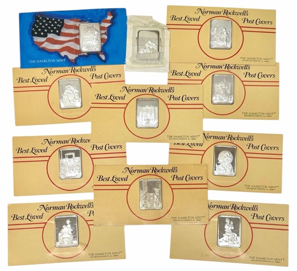 11 Pc. Hamilton Norman Rockwell Sterling Silver Ingots: 11 piece sterling silver "Norman Rockwell's Best Loved Post Covers" ingots minted by the Hamilton Mint. Total weight is approx. 11.75 troy ounces on sterling silver. Ingots are all in the original pac