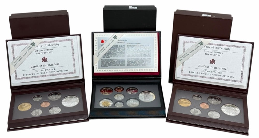 1994-1995-1997 Canada Proof Sets With Silver Commemorative Dollars: 1994, 1995 & 1997 Canada Proof Sets. The sets are in new condition in the original boxes with paperwork. The 1994 set includes the sterling silver Last RCMP's Dog Team Patrol Commemorative Dollar & br
