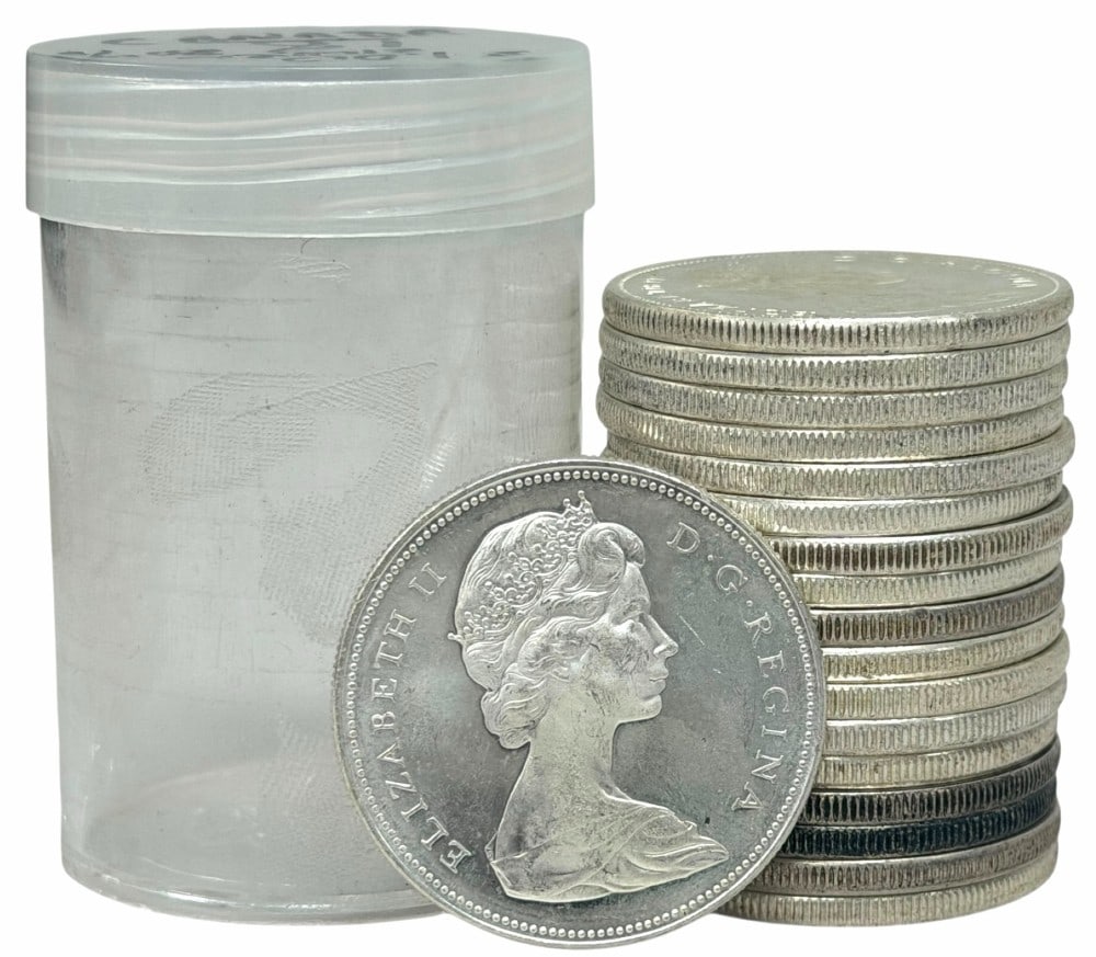 (18) 1961-1966 Canada 80% Silver Dollars: (18) Canadian 80% Silver Dollars. Dates range from 1961 through 1966 with a range of conditions. Each coin contains .60 troy ounces of pure silver, total silver weight 10.8 troy ounces of pure silver.