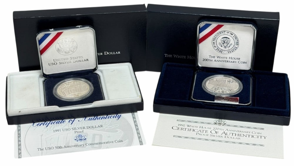 U.S. Mint 1991 USO & 1992 White House 200th Anniversary Commemorative Proof Silver Dollars: U.S. Mint 1991 USO & 1992 White House 200th Anniversary Commemorative Proof Silver Dollars. The coins are in new condition in the original box with paperwork. Each dollar is 90% silver and contains .7