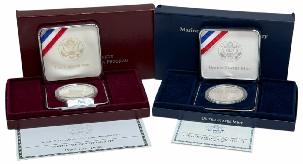 U.S. Mint 1998 Robert F. Kennedy & 2005 Marine Corps Anniversary Commemorative Proof Silver Dollars: U.S. Mint 1998 Robert F. Kennedy & 2005 Marine Corps 230th Anniversary Commemorative Proof Silver Dollars. The coins are in new condition in the original box with paperwork. Each dollar is 90% silver