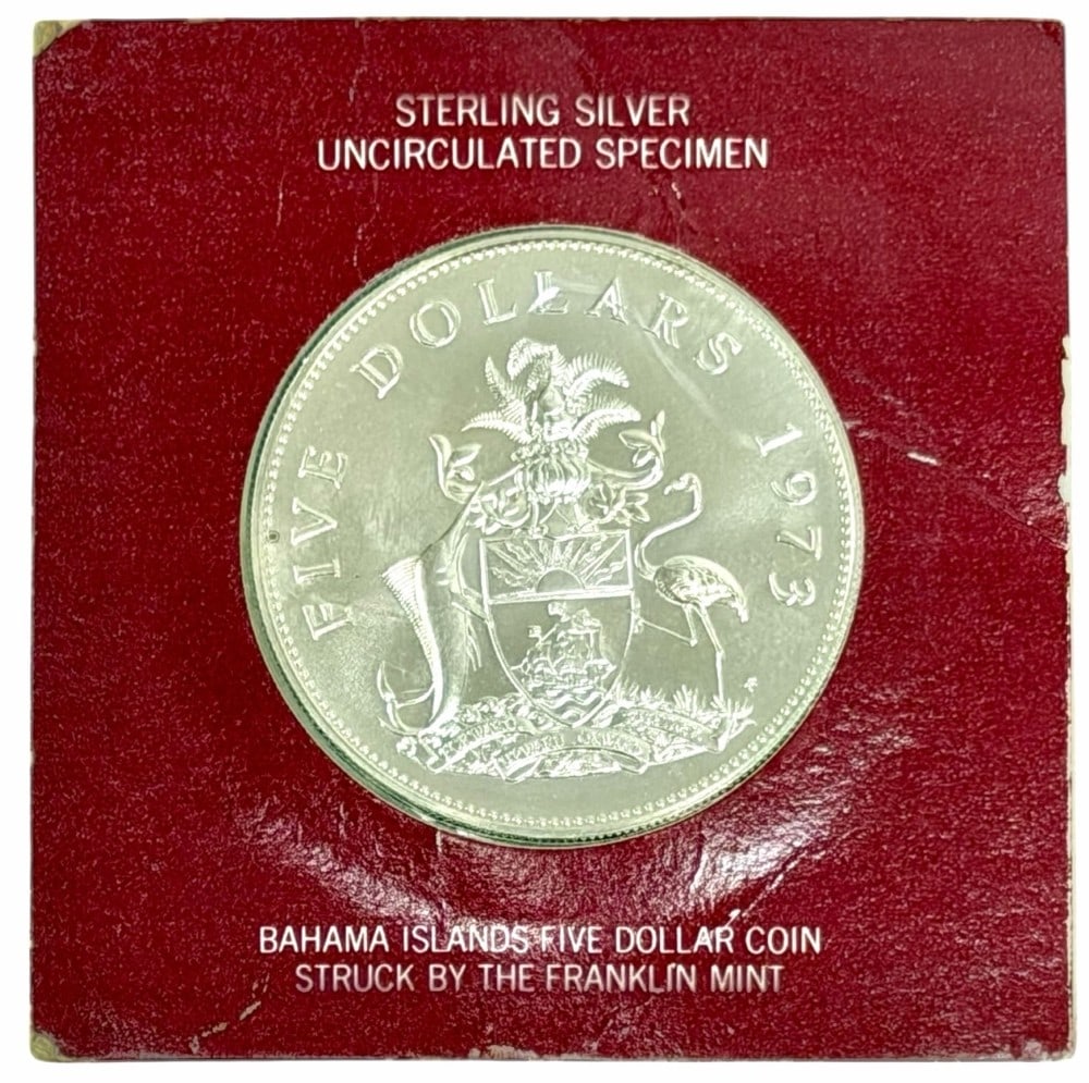 1973 Bahama Islands $5 Sterling Silver Uncirculated Specimen Coin: 1973 Bahama Islands $5 Sterling Silver Uncirculated Specimen Coin. The .925 fine coin contains 1.2526 troy ounces of pure silver. Mint condition on the original Franklin Mint card.