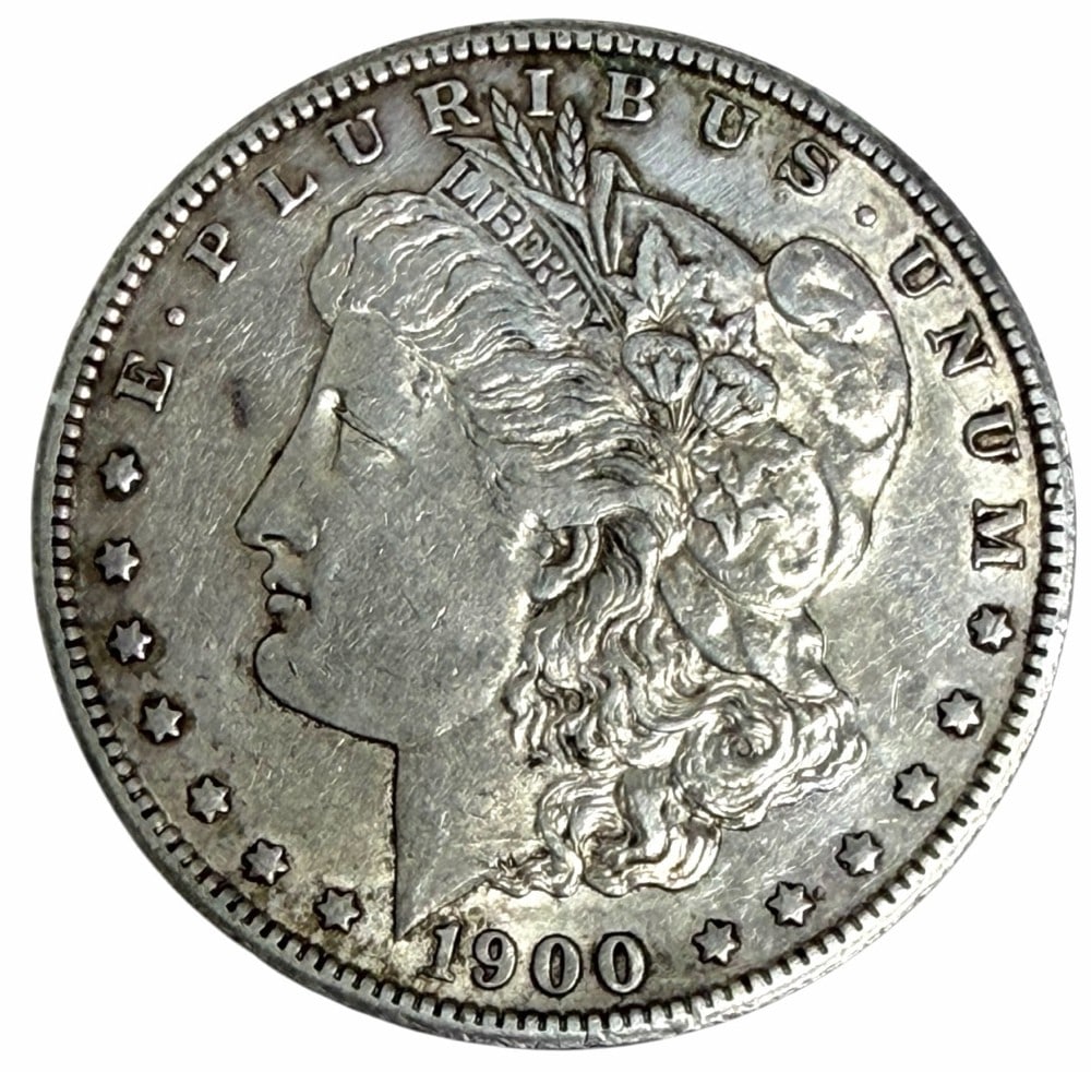 1900-S United States Morgan Silver Dollar: 1900-S United States Morgan Silver Dollar. Better circulated condition coin.