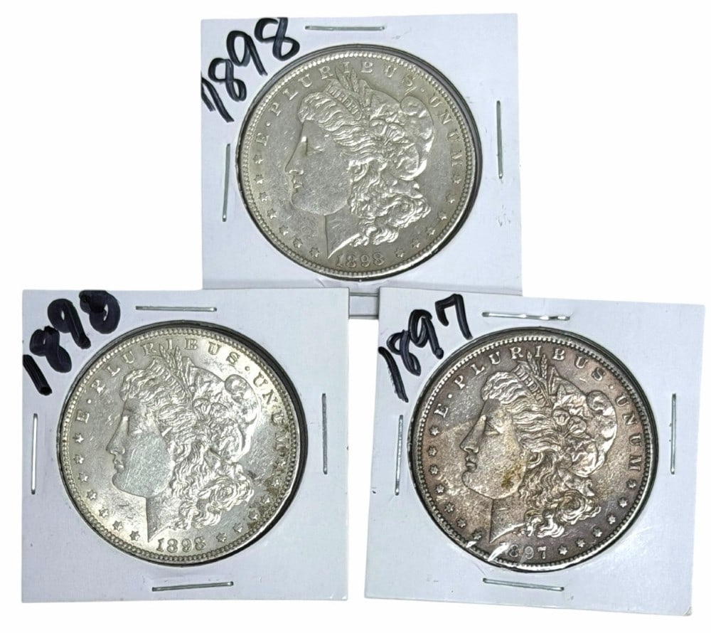 (1) 1897 & (2) 1898 United States Morgan Silver Dollars: (1) 1897 & (2) 1898 United States Morgan Silver Dollars. Better condition coins.