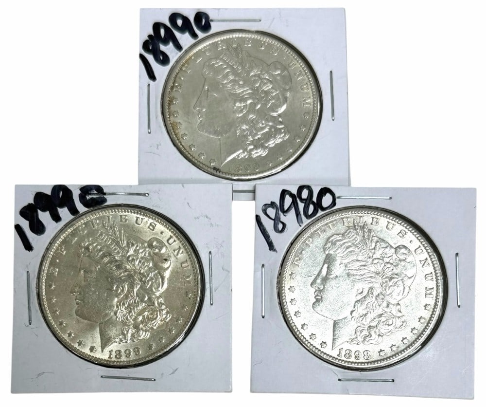 1898-O & (2) 1899-O United States Morgan Silver Dollars: 1898-O & (2) 1899-O United States Morgan Silver Dollars. Better condition coins.