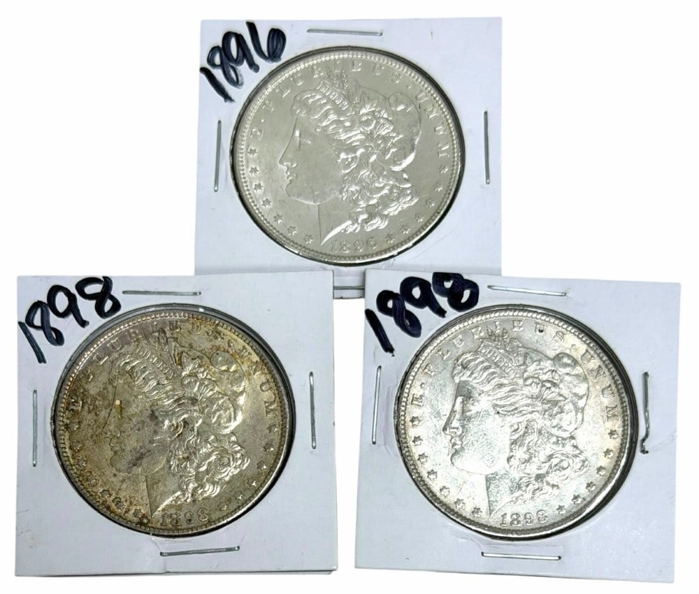 1896 & (2) 1898 United States Morgan Silver Dollars: 1896 & (2) 1898 United States Morgan Silver Dollars. Better condition coins.