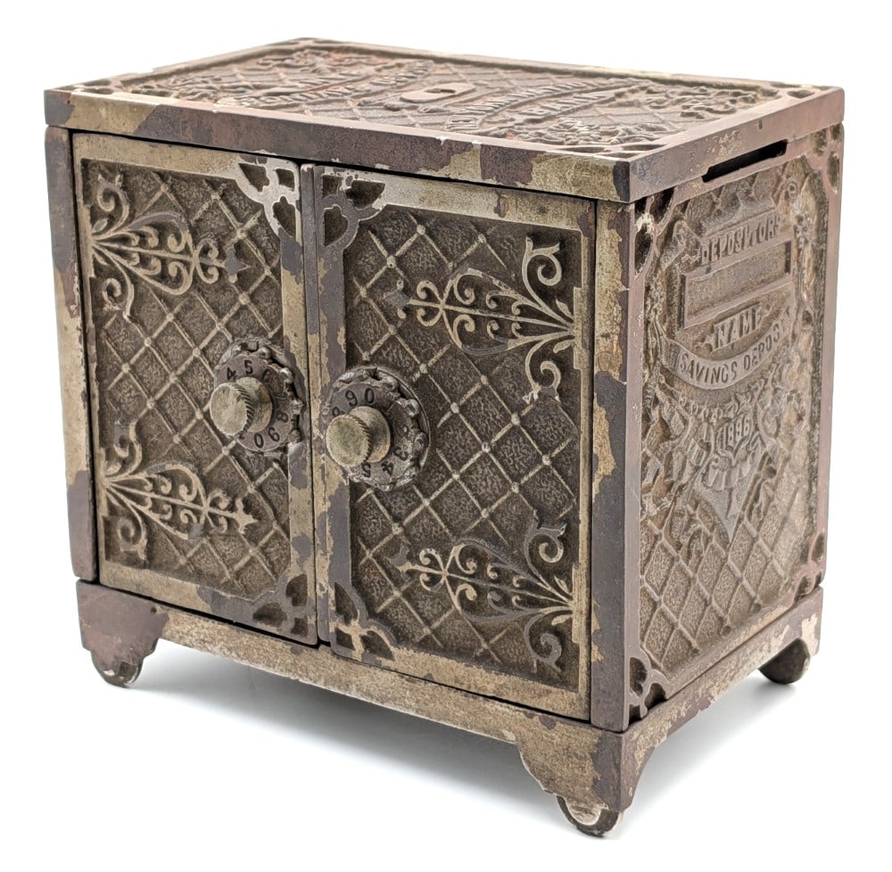 Kenton Cast Iron Double Door Chicago Savings Bank / New York National Bank: Kenton cast iron double door Chicago Savings Bank / New York National bank. The bank is marked Kenton Brand on the back and bottom of the bank. It is dated 1896 embossed on each end. A very ornate cas