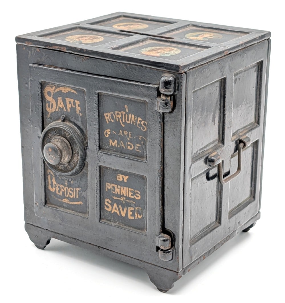 Henry C. Hart Cast Iron Safe Deposit Bank "Fortunes Are Made By Pennies Saved": Henry C. Hart cast iron Safe Deposit "Fortunes Are Made By Pennies Saved" still bank. The bank displays very well painted in black overall with gold letter stenciling and early woman graphics on the t