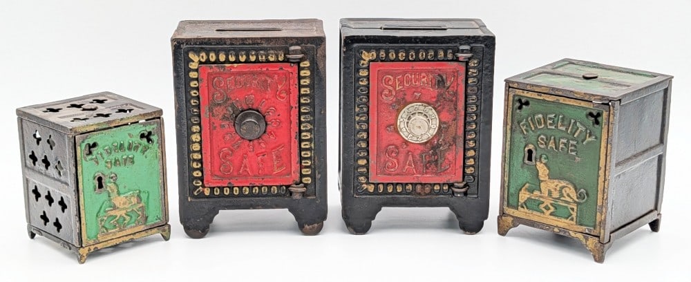 (2) Kyser & Rex Fidelity Safe and (2) Security Safe Cast Iron Still Banks: Includes two Kyser and Rex Fidelity Safe cast iron still banks and two Kyser and Rex Security Safe cast iron still banks. The key is included for the smaller Fidelity Safe, but not the larger one. No