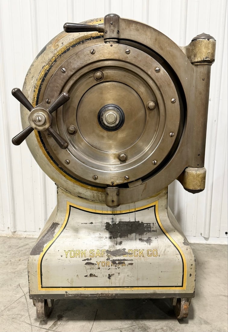 Antique York Safe & Lock Company "Cannonball" Safe: York Safe & Lock Company was established in 1882 in York, Pennsylvania. The "Cannonball" safe has a Sargent & Greenleaf 3-Dial mechanical time lock, marked G79. The inside of the main door has a keyed
