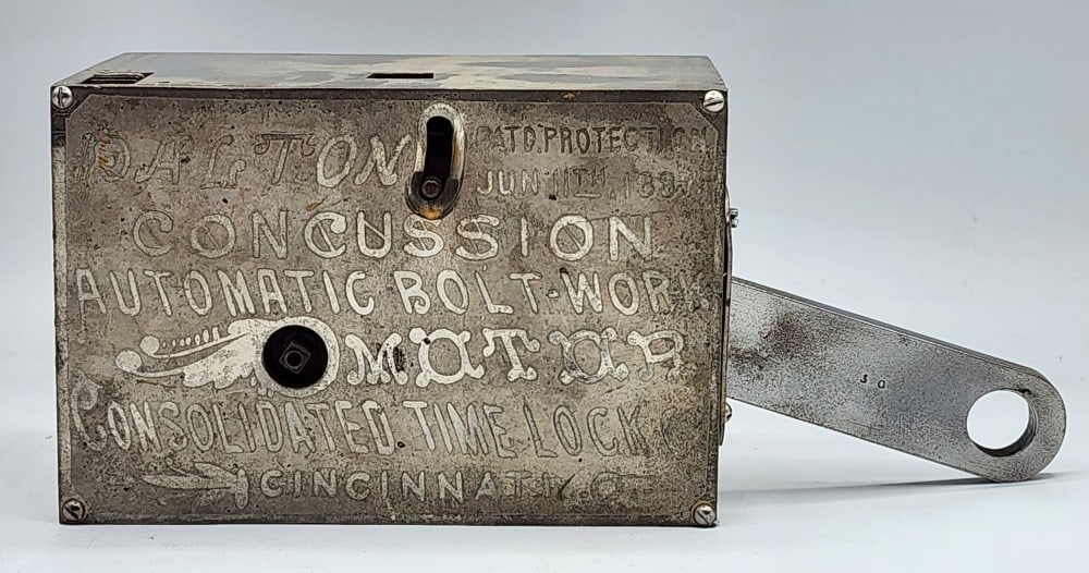 Consolidated Time Lock Co Concussion Automatic Bolt Work Bank Vault Time Lock: Consolidated Time Lock Co is a company from Cincinnati, Ohio. Patent protection June 11th, 1887. Lock uses independent watch mechanisms to lock the safe at certain times. Light wear on metal due to ag