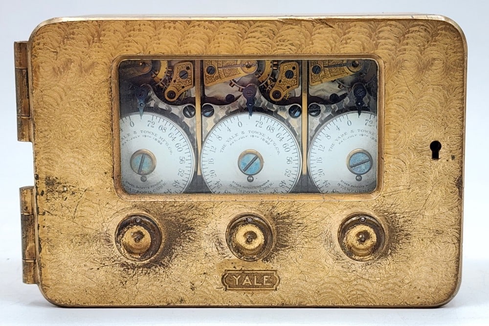 The Yale & Towne Mfg Co Bank Vault Time Lock Mechanism: Yale & Towne is a company based in Stamford, Connecticut. The mechanism was patented July 19th, 1892. Lock uses 3 independent watch mechanisms to lock the safe at certain times. Metal is worn due to a