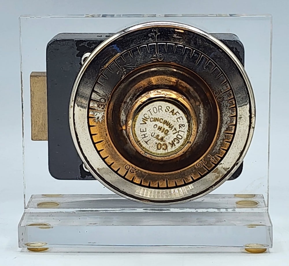 Sargent & Greenleaf Safe Lock Mechanism Acrylic Display: Sargent & Greenleaf is a company in Rochester N.Y. The dial is marked Victor Safe & Lock Co which is a company based in Cincinnati, Ohio. Metal is worn due to age and handling. Measures approximately