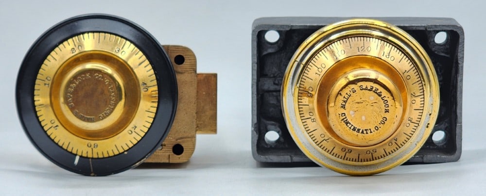 2 Hall's Safe & Lock Co Safe Combination Dial Lock Mechanisms: Hall's is a company based in Cincinnati, Ohio. 1-70 and 1-130. Mechanisms are encased in cast metal. The locks use single bolt locking point systems. Metal is worn due to age and use. Bigger lock meas