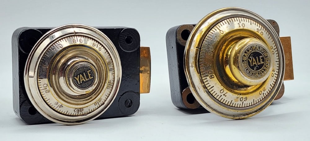 2 Yale Safe Combination Dial Lock Mechanisms: Yale is a company from Stamford, Connecticut. Dials are marked 0-99. Mechanisms are encased in black cast metal. Locks use single bolt locking point systems. Metal is worn due to age and use. Bigger m
