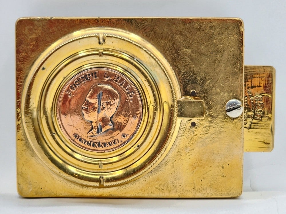 Joseph L. Hall's Safe Co Safe Lock Mechanism: Hall's is a company based in Cincinnati, Ohio. The mechanism was patented on September 7, 1869 and is encased in polished cast metal. The lock is marked 8297. Light wear in metal due to age and use. M