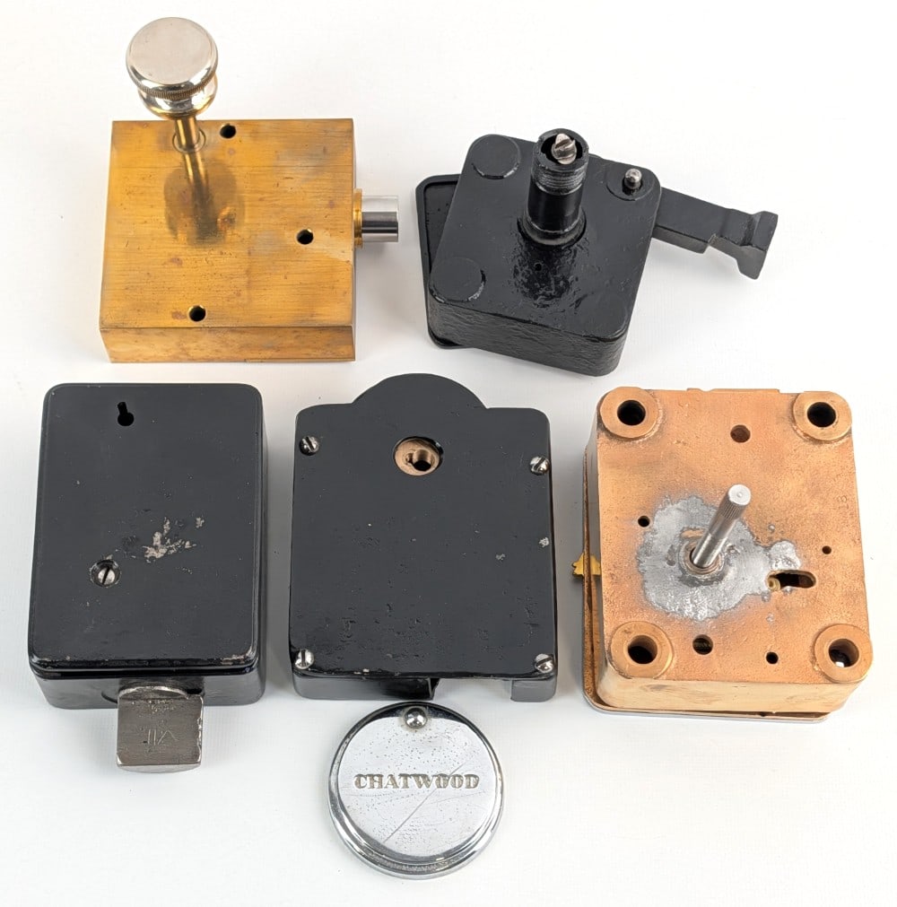 Antique Combination Safe Mechanisms: Includes different brands and styles of mechanisms.