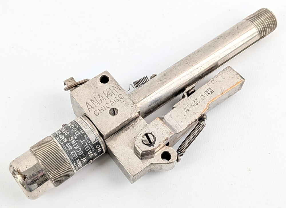 Ankin Lock & Alarm Co. Vault Door Relocking Device: Appears to be in nice condition with a nickel finish, patent stampings, and a makers plate. Measures 9-1/4in long.