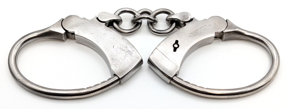 Mattatuck Mfg. Co. Handcuffs: Mattatuck Mfg. Co. handcuffs. The handcuffs are in good condition, but no key is included.