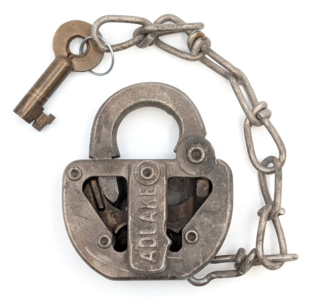Adlake Cutaway / Sample Padlock: Adlake cutaway / sample padlock. The padlock shows wear from age. Measures approximately 3-1/2" long.