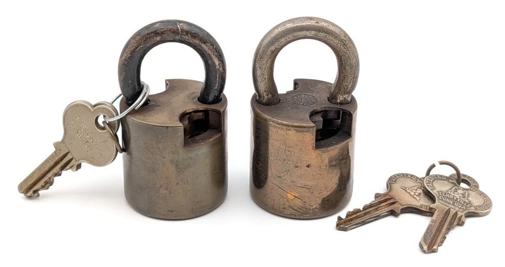 (2) Eagle Cutaway Salesman Sample Padlock w/ Keys: (2) Eagle cutaway salesman sample padlock with keys. The padlocksshows wear from age and handling. Each measures approximately 3" long.