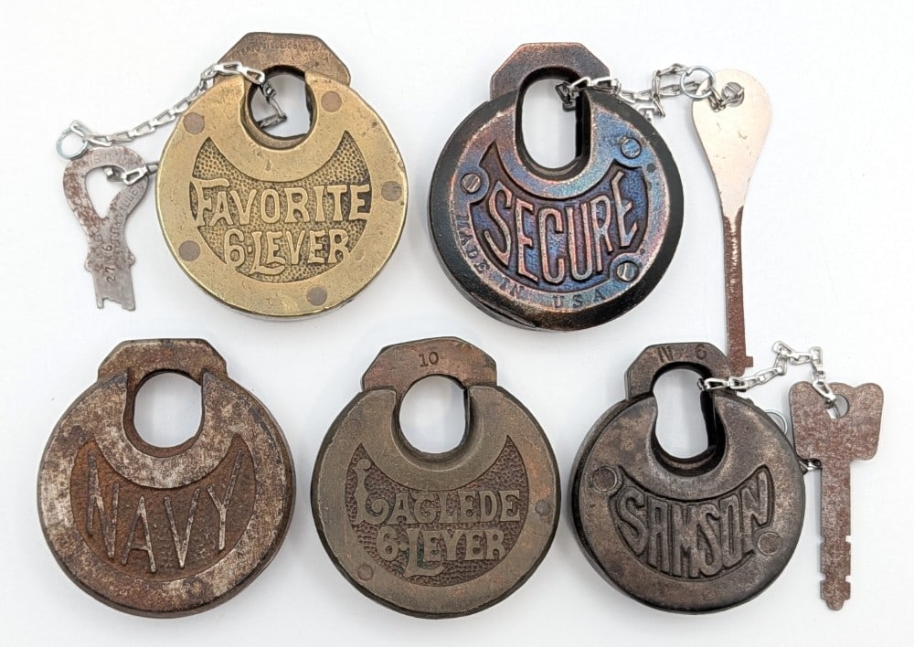 (5) Various Brand Multi Lever Padlocks: Brands include Secure, Laglede, Favorite, Samson, & Navy. Three of the locks come with keys. Locks are in good condition with scuffs and and wear from use and age. Measures 2-3/4in long.