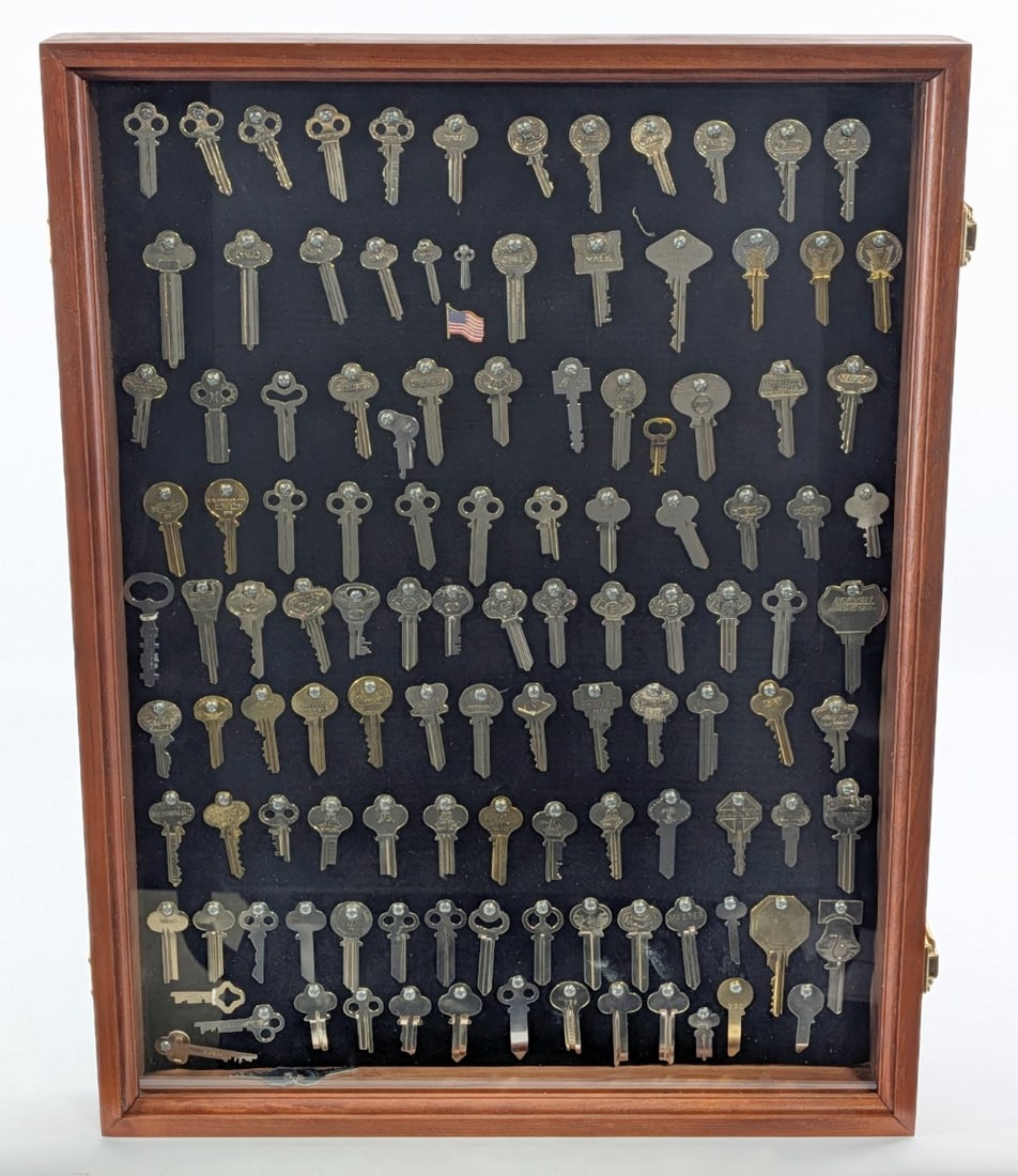 Antique Key Shadowbox Display: Includes many different makes with both typical and non typical styles of keys. Display measures 18in x 24in.