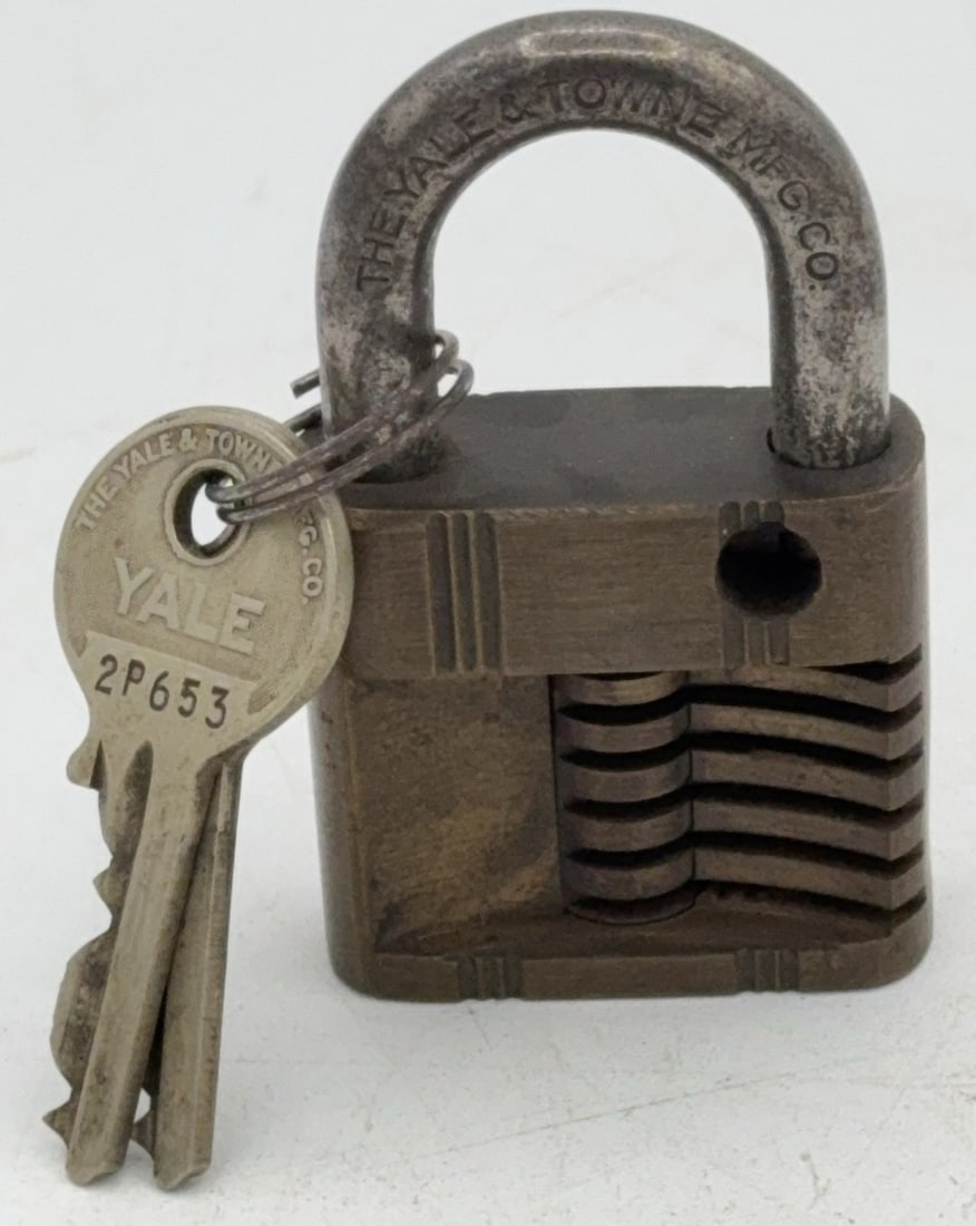 Yale Cut Away Padlock Salesman Sample: Lock is in good condition with scuffs and wear from age and handling. Comes with the keys. Measures 2-1/2in long.