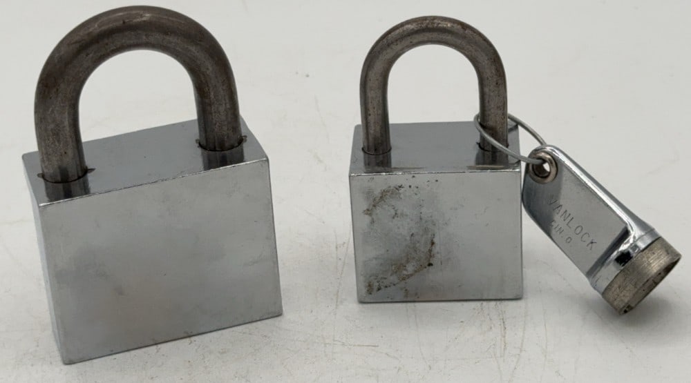 (2) Unknown Brand Cylinder Key Cut Away Padlock Salesman Samples: Lock is in good condition with scuffs and wear from age and handling. Comes with the key. Largest measures 3in long.
