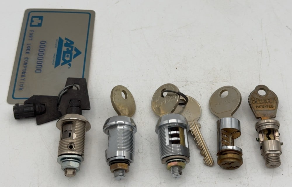 Medeco, Apex, Kaba, & Bellock Lock Tumbler Cut Away Salesman Samples: Locks are in good condition with scuffs and wear from age and handling. Locks come with keys.