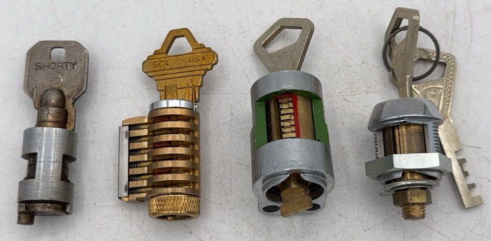 Abloy, Oblon, Chicago Lock Co., & Unmarked Lock Tumbler Cut Away Salesman Samples (1 of 9)