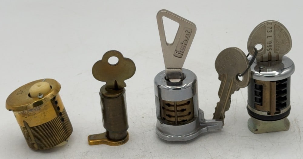 Ingersoll, Fichet, & SCO Lock Tumbler Cut Away Salesman Samples: Locks are in good condition with scuffs and wear from age and handling. Locks come with keys.