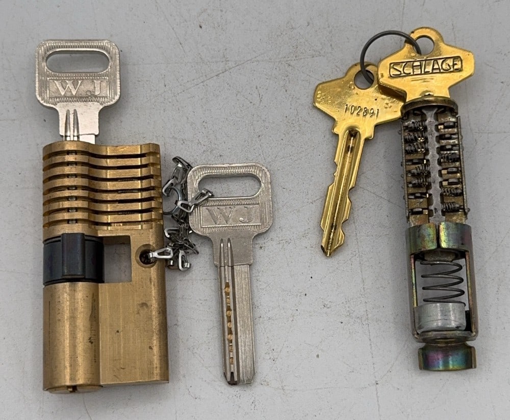 WJ & Schlage Lock Tumbler Cut Away Salesman Samples: Locks are in good condition with scuffs and wear from age and handling. Locks come with keys.