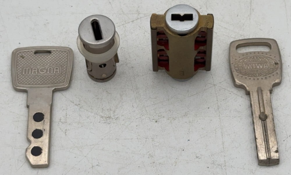 MIWA EC Cylinder & Magna Magnetic Lock Tumbler Cut Away Salesman Samples: Locks are in good condition with scuffs and wear from age and handling. Locks come with keys.