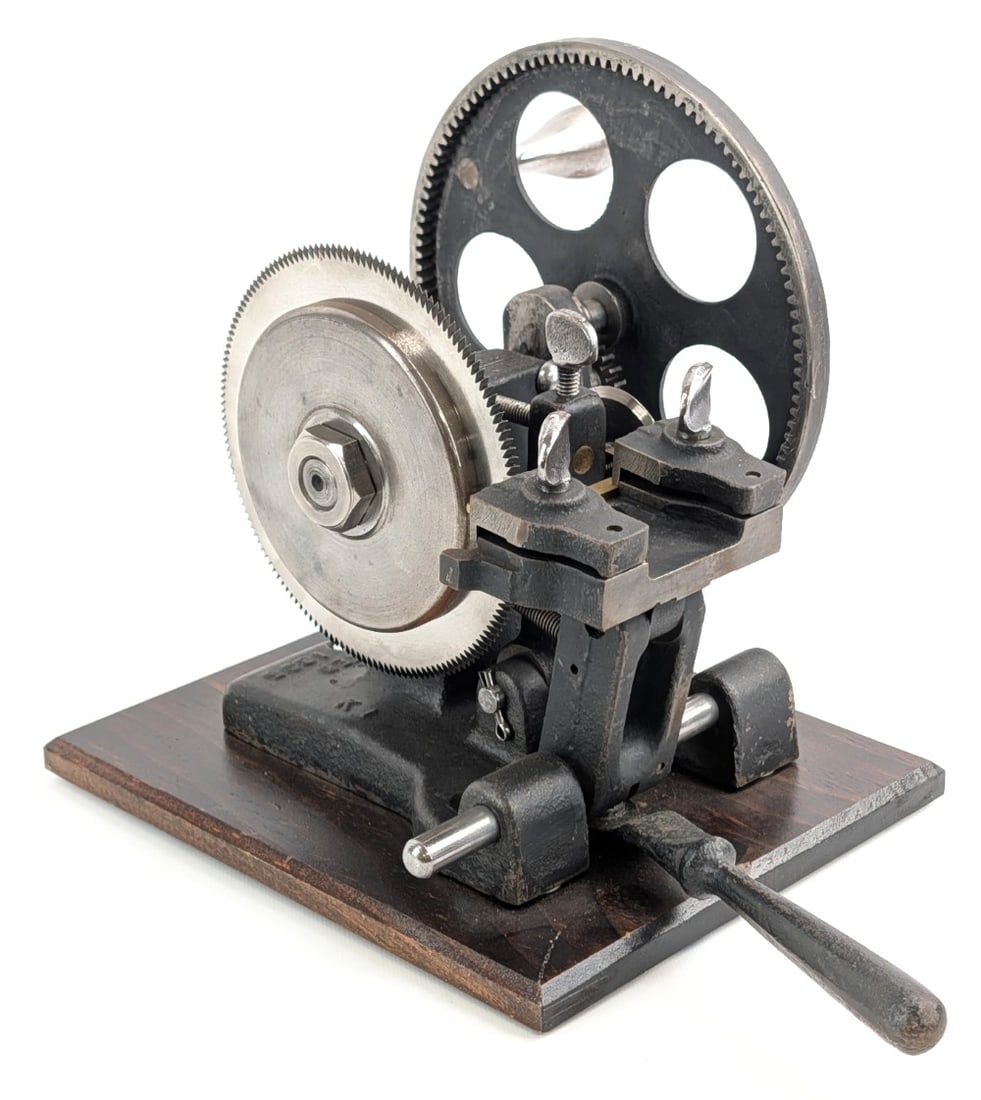 Antique 1895 Patent Manual Key Cutter: Machine is in nice functioning condition mounted on a wood base. Overall measures 10in wide x 8in deep x 10in tall.