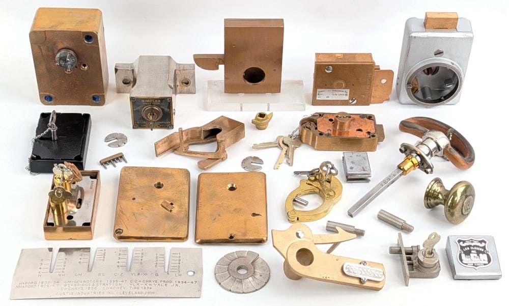 Various Safe & Lock Parts: Includes locking mechanism, housings, and other parts.
