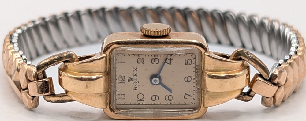 Ladies Vintage Rolex 18k Rose Gold Wristwatch: Vintage Ladies 18k Rose Gold Rolex Wristwatch. Watch has a 18k gold case and a stainless & gold filled band. It features a 17 jewel mechanical movement, the case measures 13mm wide x 29mm long includi