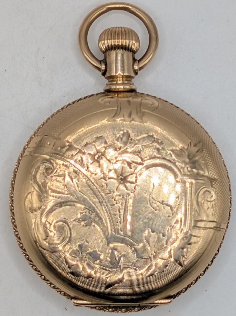1893 Elgin Grade 109 0 Size Hunting Case Pocket Watch: 1893 Elgin Grade 109 Pocket Watch. The 7 jewel size 0 hunting case watch is in nice used condition and is running well, has some monograms. Comes in a J. Boss 20 Year case, has a clean face. Has origi