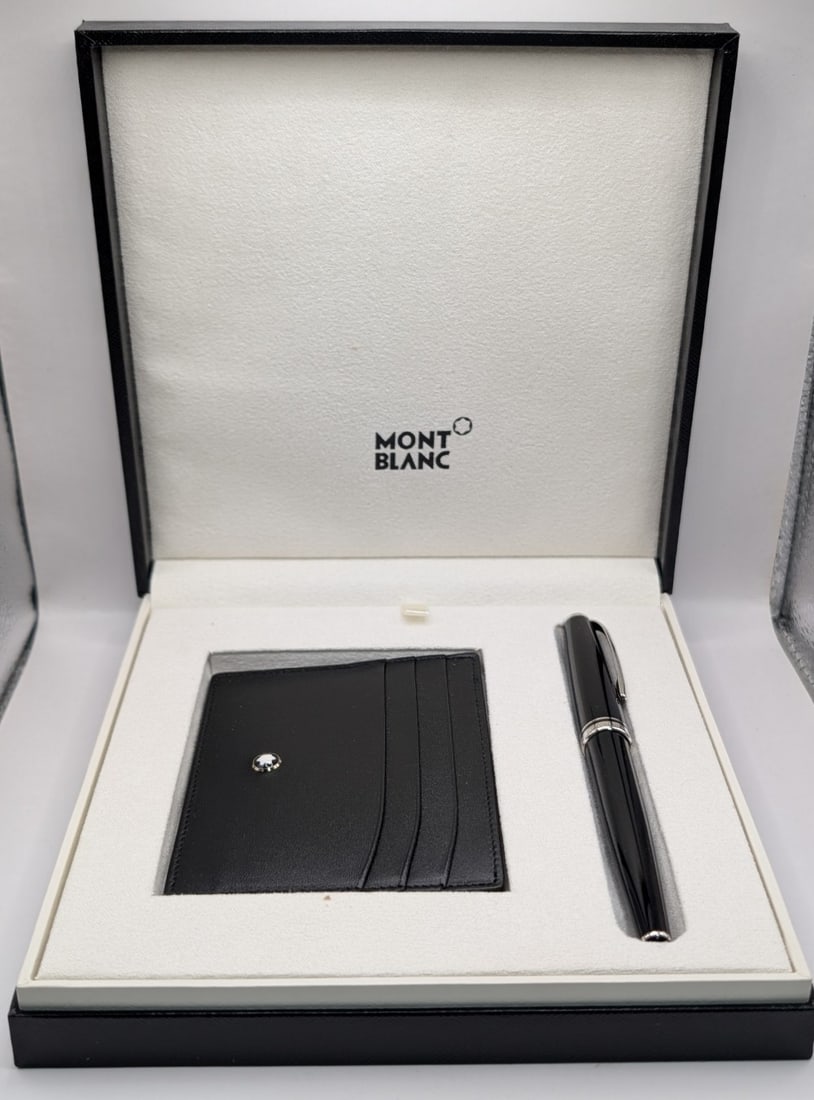 Montblanc Cruise Collection Black Ballpoint Pen & Montblanc Black Credit Card Holder In Box #114117: MontBlanc Cruise Collection Ballpoint Pen & Montblanc Black Leather Business Card Pocket Holder Set. The German pen is capped and serial numbered, the Italian made leather pocket holder holds 6 credit