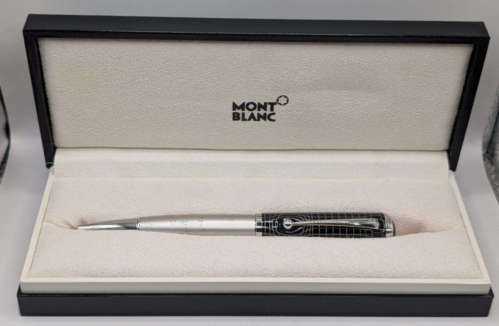 Montblanc Great Characters Albert Einstein Limited Edition Ballpoint Pen #M28801: Montblanc Great Characters Albert Einstein Limited Edition Ballpoint Pen. The platinum plated body is engraved with the scientist's most famous formulas. Platinum-plated lines cluster around the cap i
