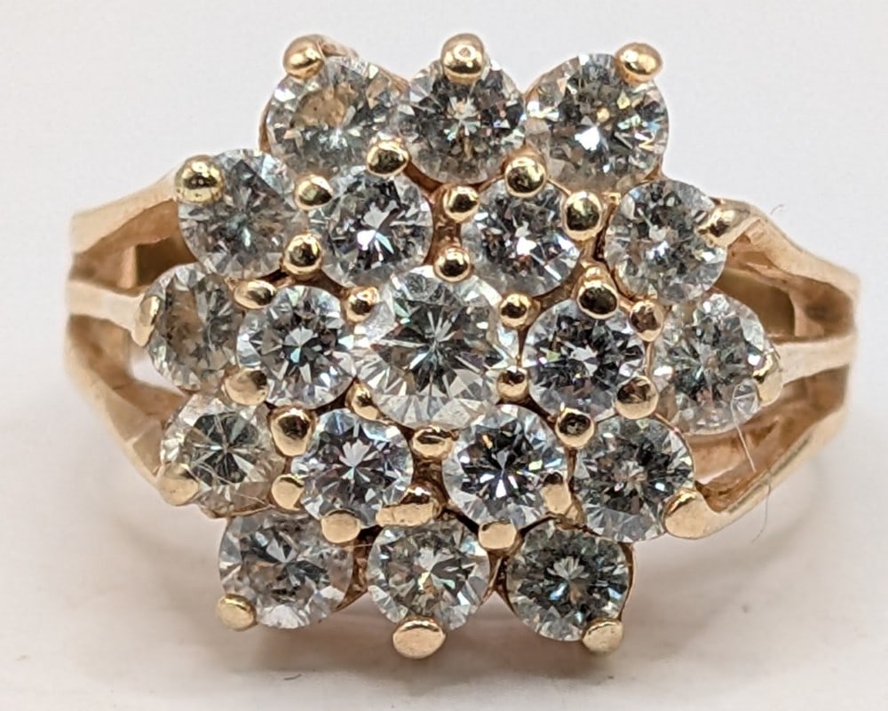 18K Gold Diamond Cluster Cocktail Ring: 18K yellow gold cocktail ring with (19) round cut diamonds. Ring is size 5 and weighs 6.2 grams.
