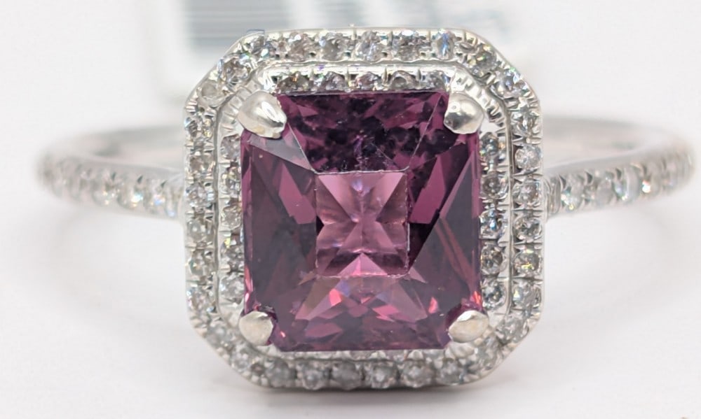 18K Gold Pink Spinel & Diamond Ring: 18K white gold ring with 2.09 CT unheated pink spinel and (68) round cut brilliant diamonds totaling 0.29 CTS. Ring is size 6.5 and weighs 3.5 grams. Ring comes with a Gemassure gemological appraisal